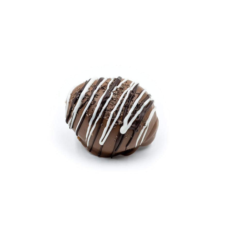 1/4 lb. milk chocolate egg filled with cookies n cream center, drizzled with dark chocolate and white coating and sprinkled with oreo cookie crumbs. 