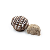 1/4 lb. milk chocolate egg filled with cookies n cream center, drizzled with dark chocolate and white coating and sprinkled with oreo cookie crumbs.