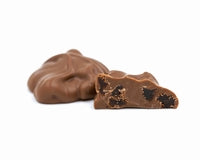 Cluster of raisins dipped in milk chocolate.