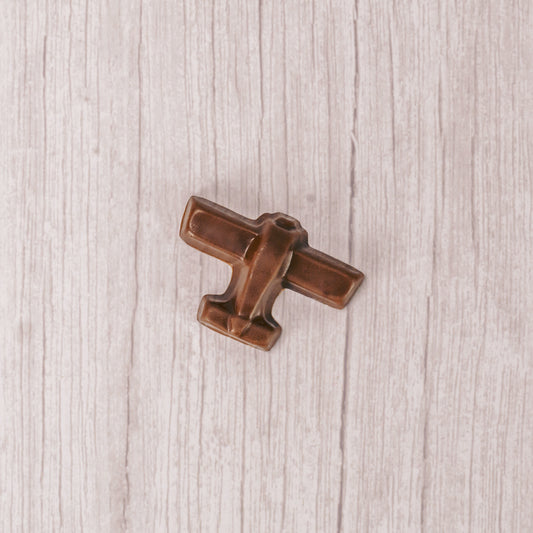 Bite size milk chocolate airplane.