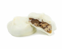 pecans and caramel dipped in white coating. Like a turtle