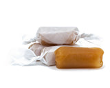 butterscotch caramels wrapped in wax paper. half pound bags.